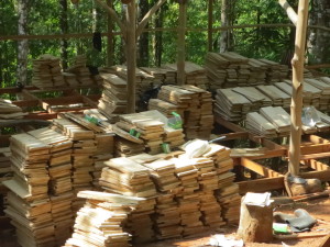 A whole lot of wooden shingles - all hand made right here.